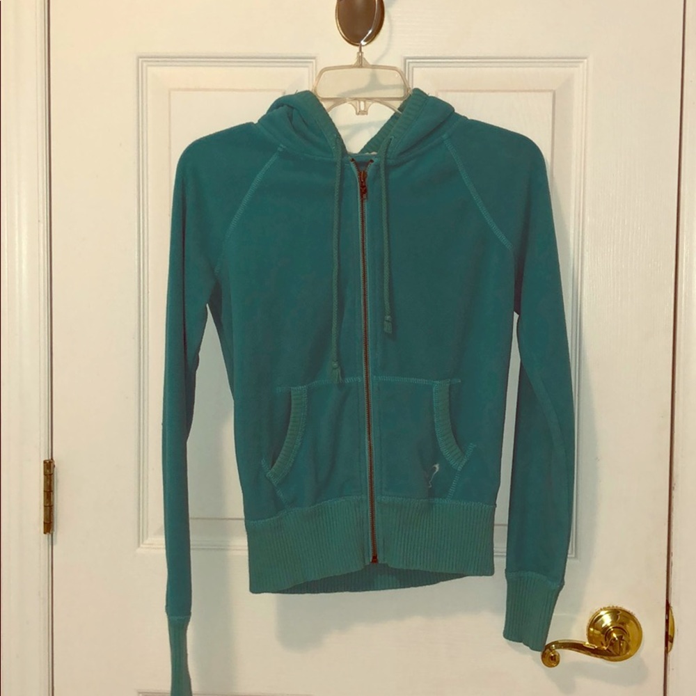 LIGHT BLUE AMERICAN EAGLE WARM ZIP UP JACKET. In good condition. Size XS.